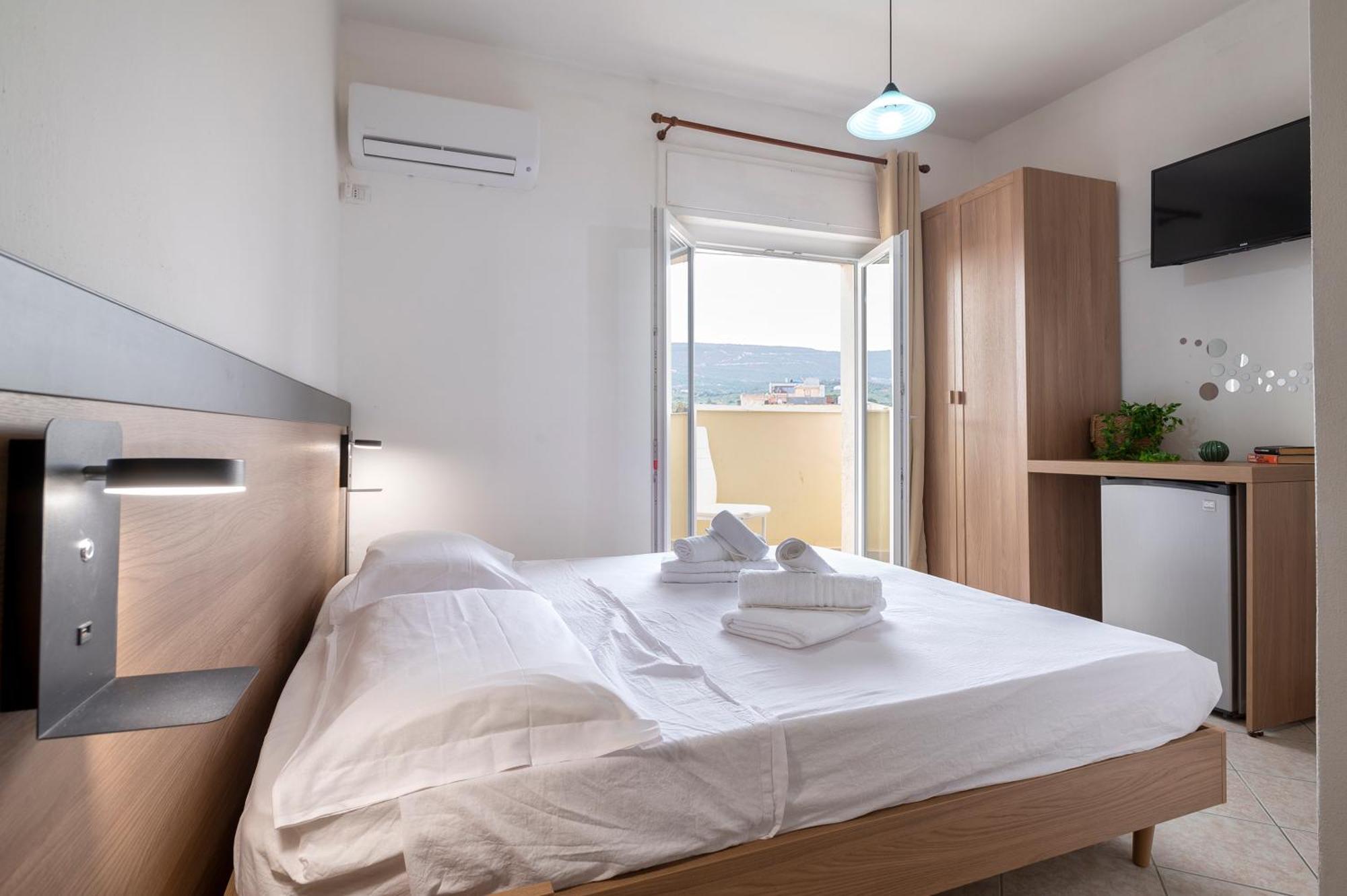 Oasis Guest House Alghero Esterno foto